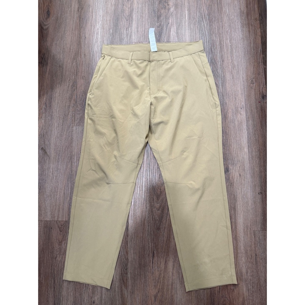 Fabletics Men One Pant Khaki Tan Stretch Tech Travel Golf Pants 34x30 PT2253840
